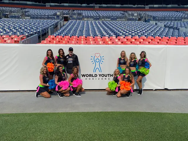 Teams and volunteers in front of the World Youth Horizons stadium banner